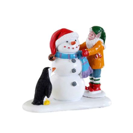 Agrandir l'image de Construction d'un bonhomme de neige Image de Construction d'un bonhomme de neige